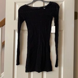 Moda International Black knit shirt, never worn